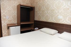 Postel nebo postele na pokoji v ubytování Hotel Villa Canoas
