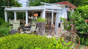 Gallery image of Ferienhaus Gartenidylle in Rhauderfehn +10 photos