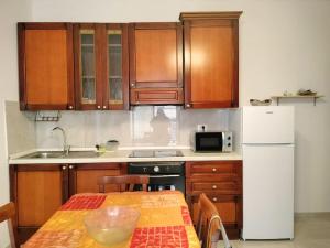 O bucătărie sau chicinetă la Martina house +7 fotografii