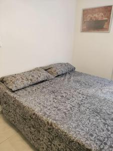 Un pat sau paturi într-o cameră la Martina house