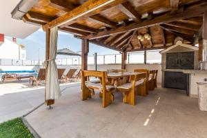 Balkón nebo terasa v ubytování Exclusive Villa Holiday