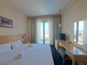 Una cama o camas en una habitación de Hotel Marica