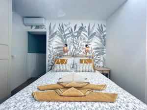 Katil atau katil-katil dalam bilik di MER DELUXE - DREAMY BOHO RETREAT