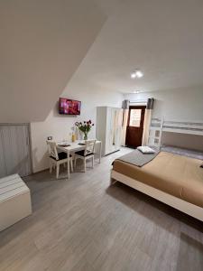 Ένα ή περισσότερα κρεβάτια σε δωμάτιο στο Casa PEPPINA