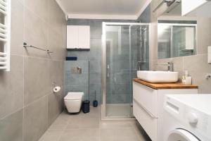 Kúpeľňa v ubytovaní Przystań Letnica by Comfort Apartments