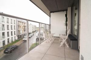 Balkón alebo terasa v ubytovaní Przystań Letnica by Comfort Apartments