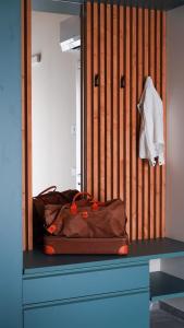 En eller flere senge i et værelse på CALA Appartamenti + 65 billeder