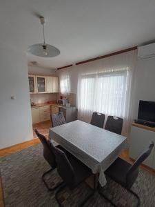 Kuchyň nebo kuchyňský kout v ubytování Apartman Helena