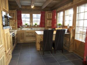 Kuchyň nebo kuchyňský kout v ubytování Chalet Jean