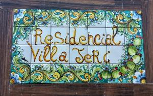 a tile sign with the words residential villa yard at Residencial Villa Jeri - AP with balcony, optional BREAKFAST in Jericoacoara +37 photos