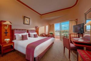 Postel nebo postele na pokoji v ubytování Es Saadi Marrakech Resort - Hotel