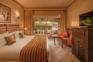 Postel nebo postele na pokoji v ubytování Es Saadi Marrakech Resort - Hotel