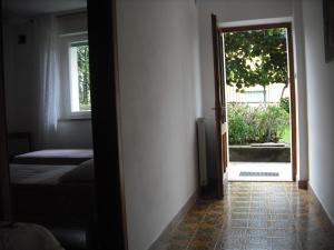 A bed or beds in a room at Casa Martello