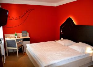 Postel nebo postele na pokoji v ubytování Hotel Zur Mühle