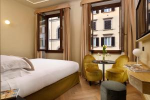 Postel nebo postele na pokoji v ubytování Floren Hotel