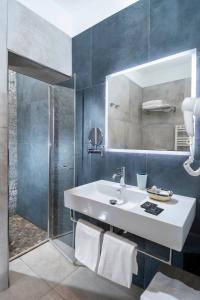 Kúpeľňa v ubytovaní B&B Primrose Residence Hotel