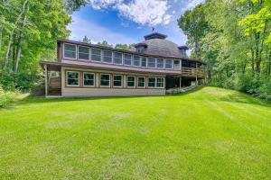 a large house with a large lawn in front of it at Wisconsin Vacation Rental 1 Mi to Road America! in Plymouth