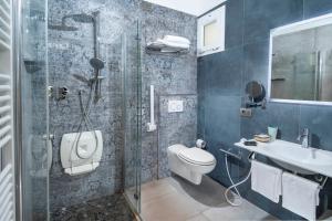 Kúpeľňa v ubytovaní B&B Primrose Residence Hotel
