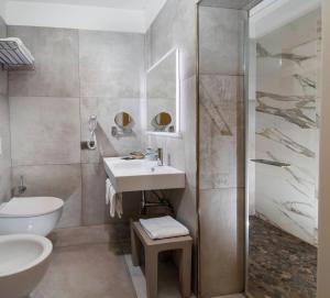 Kúpeľňa v ubytovaní B&B Primrose Residence Hotel