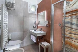 Kúpeľňa v ubytovaní B&B Primrose Residence Hotel