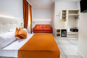 Posteľ alebo postele v izbe v ubytovaní B&B Primrose Residence Hotel