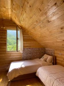 Postel nebo postele na pokoji v ubytování VITA Guesthouse