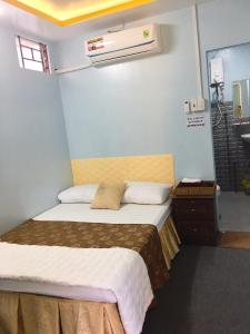 Voodi või voodid majutusasutuse Homestay RV toas