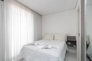 Cama ou camas em um quarto em Studio Espaço Moderno