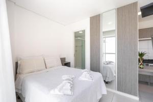 Cama ou camas em um quarto em Studio Espaço Moderno