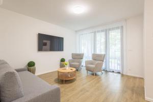 Posedenie v ubytovaní Haven Apartman Zamárdi By BLTN