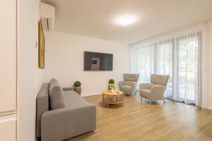 Posedenie v ubytovaní Haven Apartman Zamárdi By BLTN