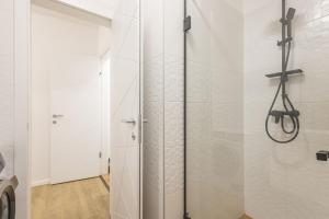 Kúpeľňa v ubytovaní Haven Apartman Zamárdi By BLTN