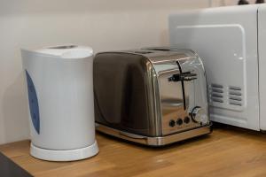 Príslušenstvo na prípravu kávy alebo čaju v ubytovaní Haven Apartman Zamárdi By BLTN