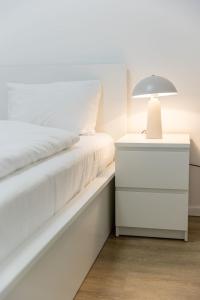 Posteľ alebo postele v izbe v ubytovaní Haven Apartman Zamárdi By BLTN