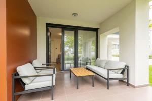 Posedenie v ubytovaní Haven Apartman Zamárdi By BLTN
