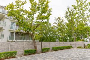 Vonkajšia záhrada v ubytovaní Haven Apartman Zamárdi By BLTN