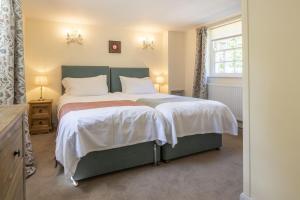 Katil atau katil-katil dalam bilik di The Old Potting Shed, Egton