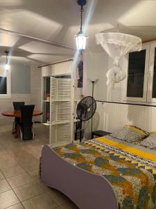 Postel nebo postele na pokoji v ubytování Résidence cannelle