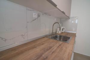 Kuchyň nebo kuchyňský kout v ubytování Marija