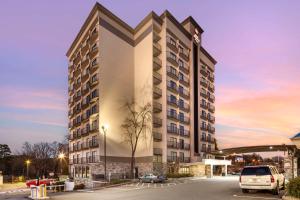 a rendering of a building with a parking lot at Best Western Plus Atlanta Airport East in Atlanta