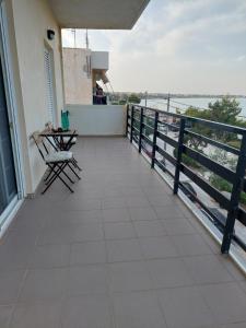 Balkón alebo terasa v ubytovaní Eleni's seafront apartment