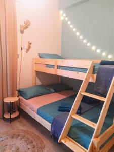 Ένα ή περισσότερα κρεβάτια σε δωμάτιο στο SeaView Backyard +35 φωτογραφίες