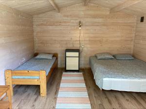 Postel nebo postele na pokoji v ubytování Kuriste camping