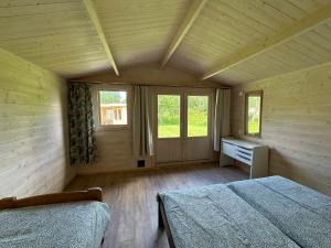 Postel nebo postele na pokoji v ubytování Kuriste camping