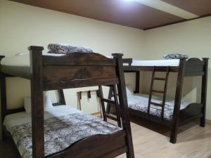Katil atau katil-katil dalam bilik di Find Land & a Rest