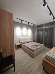 Krevet ili kreveti u jedinici u okviru objekta I&S Apartment 4