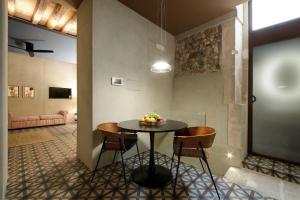TV a/nebo společenská místnost v ubytování Amore Mio Suite - Ortigia Holidays