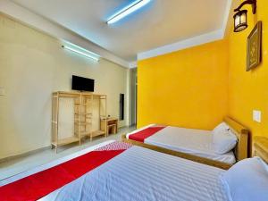 Letto o letti in una camera di Gold's House
