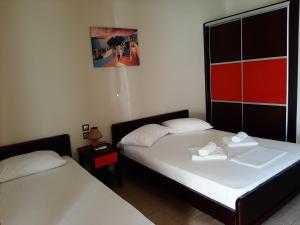 A bed or beds in a room at Studios Achileus 2