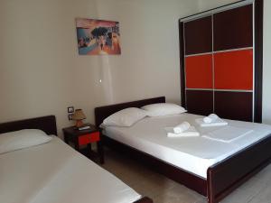 A bed or beds in a room at Studios Achileus 2